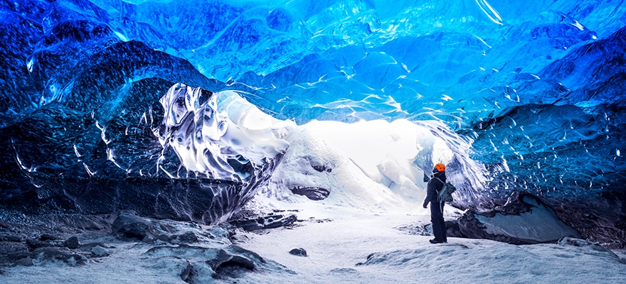 traveler-in-ice-cave-PT98G9X-880x400